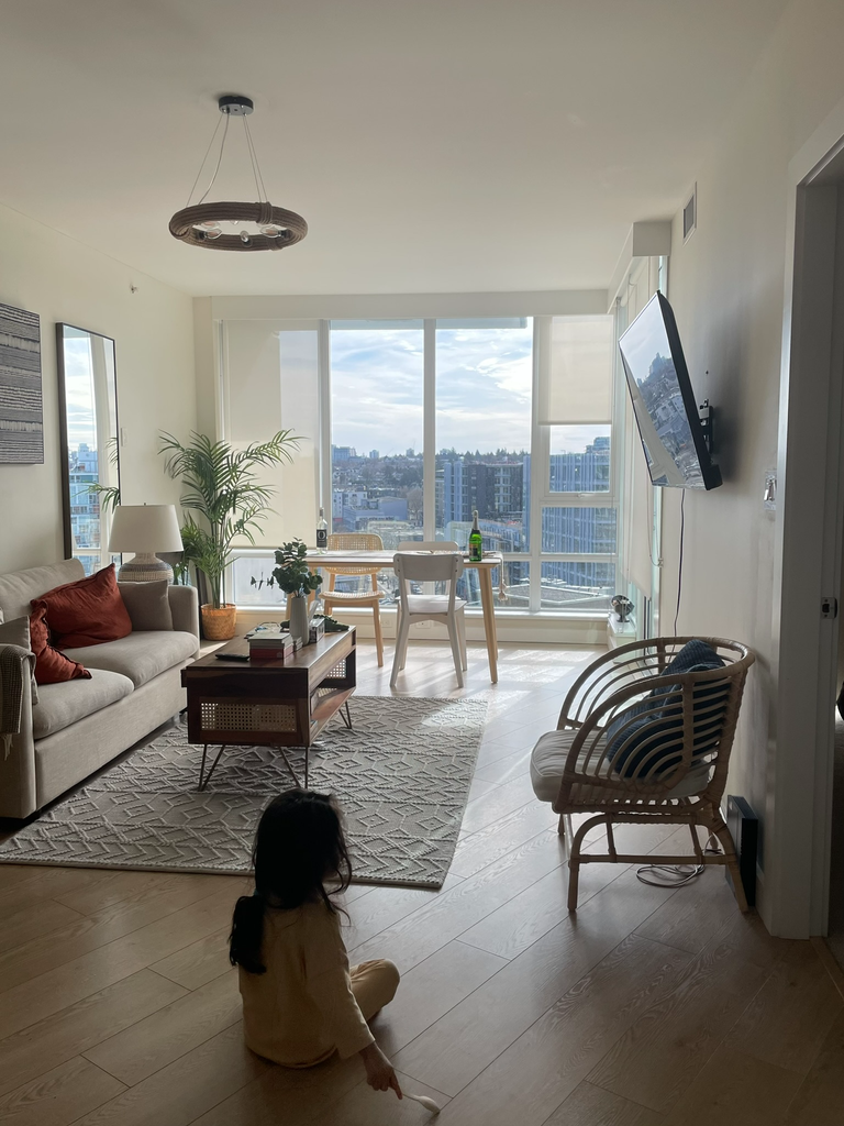 Bright Vancouver Airbnb living room with city view